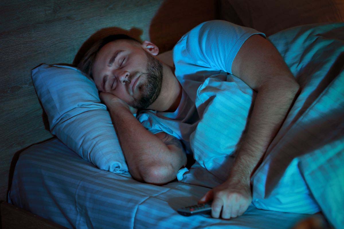 Sleeping With The TV On How Bad Is It? (Plus Tips to Try Instead)
